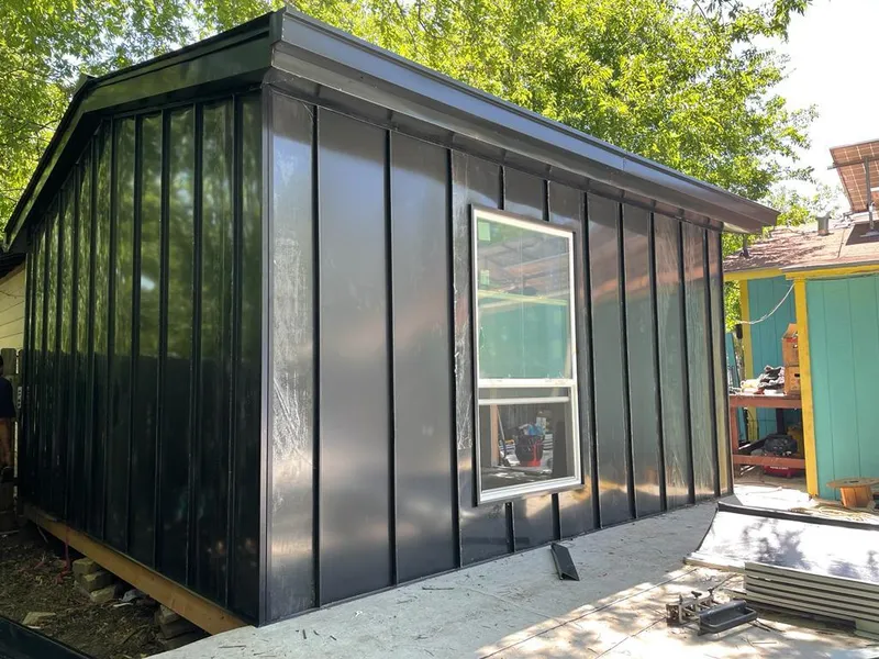 Black standing seam metal wall panels for Roof Inspection in Vinita