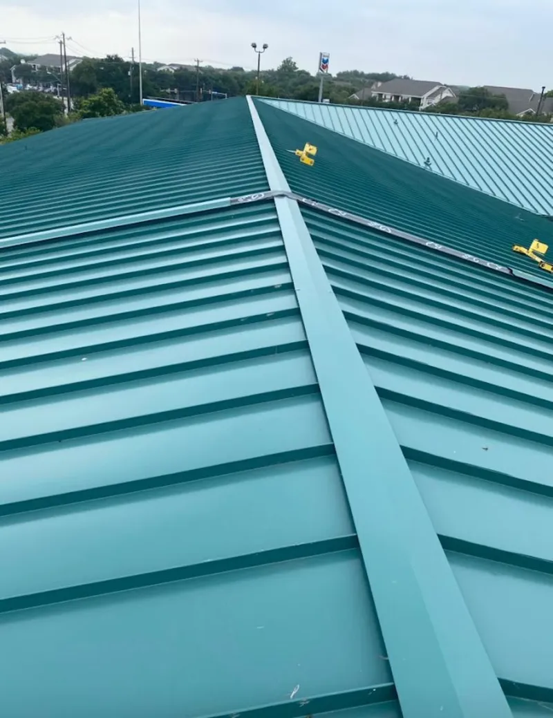 Green commercial metal roof ridge and valley for Metal Roof Repair in Vinita
