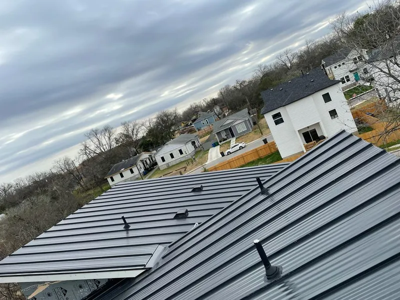 Standing seam metal roof panels with vents for Skylight Repair in Vinita